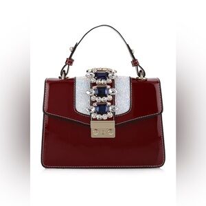 Izzy K All Decked Up Cherry Red Handbag EUC LNC